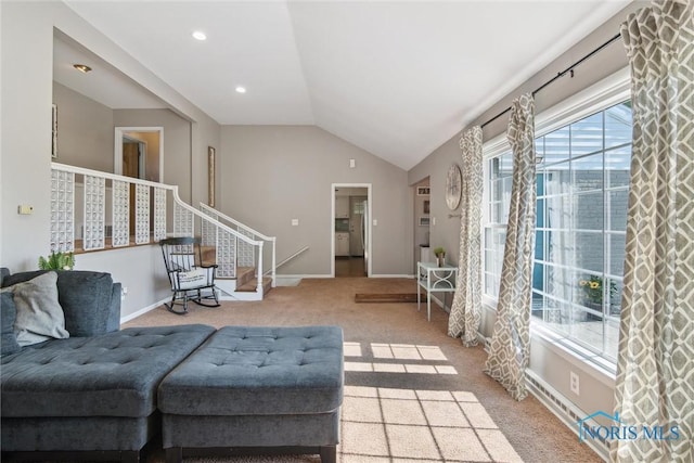 12982 State Route 34, Bryan, OH 43506 - sitting room with stairs, vaulted ceiling, and carpet flooring