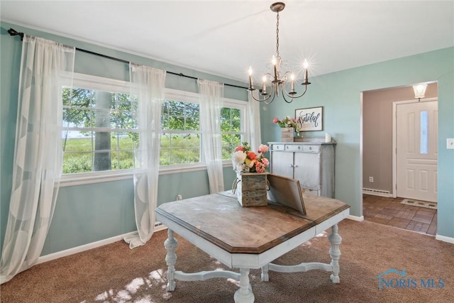 12982 State Route 34, Bryan, OH 43506 - dining area featuring a chandelier and carpet floors