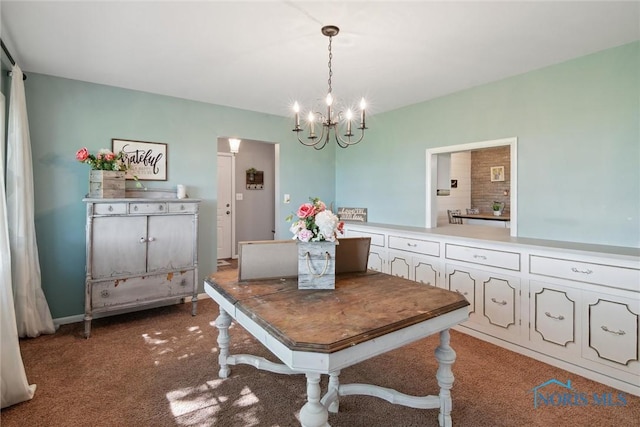 12982 State Route 34, Bryan, OH 43506 - dining space featuring a chandelier and light colored carpet