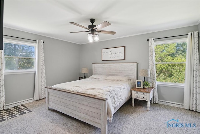 12982 State Route 34, Bryan, OH 43506 - carpeted bedroom with multiple windows, crown molding, baseboard heating, and ceiling fan