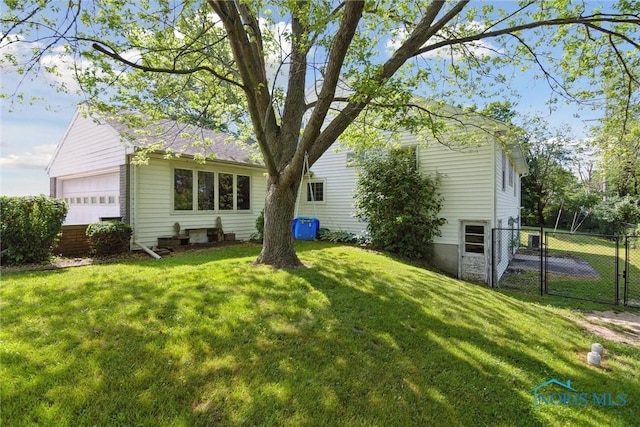 12982 State Route 34, Bryan, OH 43506 - back of property with a garage and a gate