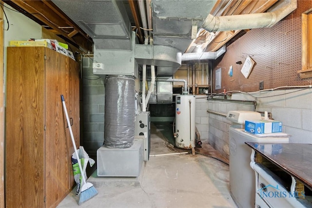 12982 State Route 34, Bryan, OH 43506 - utility room with gas water heater and washer / dryer