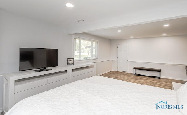 5157 Brinthaven Dr, Sylvania, OH 43560 - unfurnished bedroom with wood finished floors, recessed lighting, and beamed ceiling