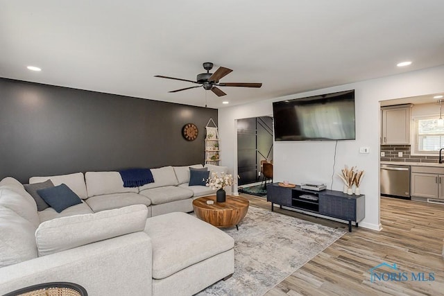 5157 Brinthaven Dr, Sylvania, OH 43560 - living area with ceiling fan, light wood-type flooring, and recessed lighting