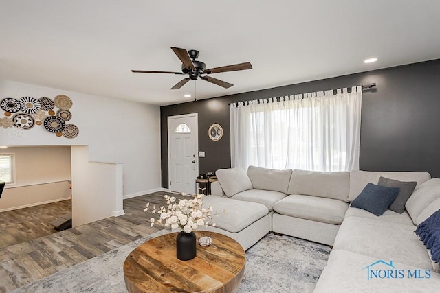 5157 Brinthaven Dr, Sylvania, OH 43560 - living area featuring wood finished floors, ceiling fan, and recessed lighting
