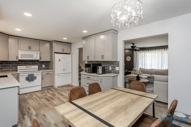 5157 Brinthaven Dr, Sylvania, OH 43560 - kitchen with white appliances, gray cabinetry, decorative backsplash, light wood-type flooring, and recessed lighting