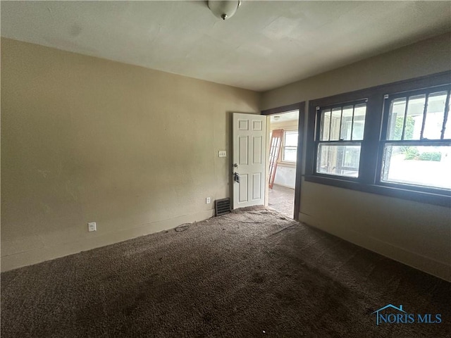 1749 Berdan Ave, Toledo, OH 43613 - unfurnished room with carpet flooring
