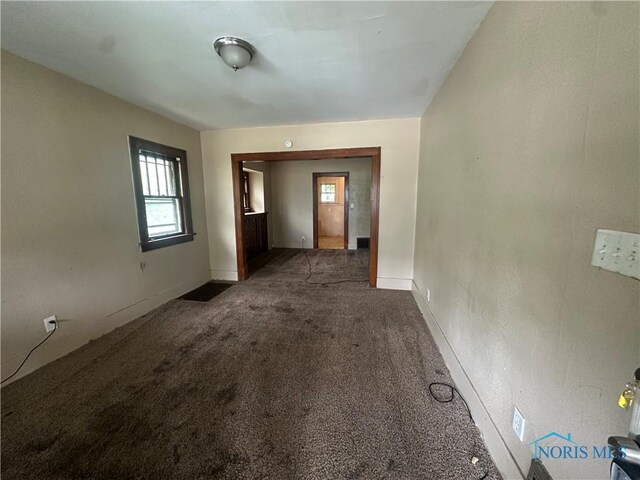 1749 Berdan Ave, Toledo, OH 43613 - carpeted empty room with plenty of natural light