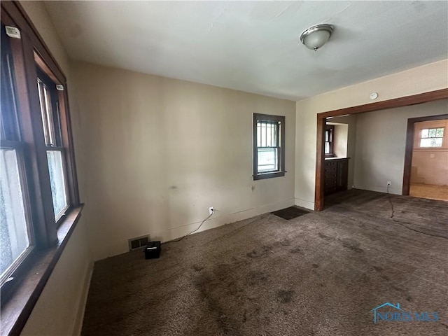 1749 Berdan Ave, Toledo, OH 43613 - spare room with baseboards and carpet floors
