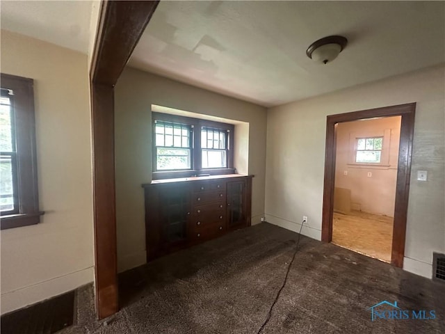 1749 Berdan Ave, Toledo, OH 43613 - unfurnished bedroom featuring carpet and baseboards