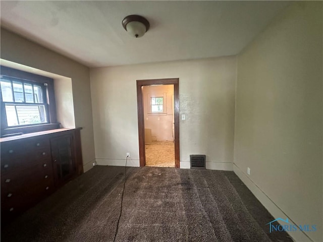 1749 Berdan Ave, Toledo, OH 43613 - unfurnished bedroom featuring baseboards and carpet