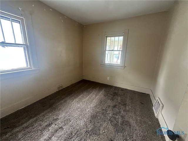 1749 Berdan Ave, Toledo, OH 43613 - carpeted empty room featuring baseboards