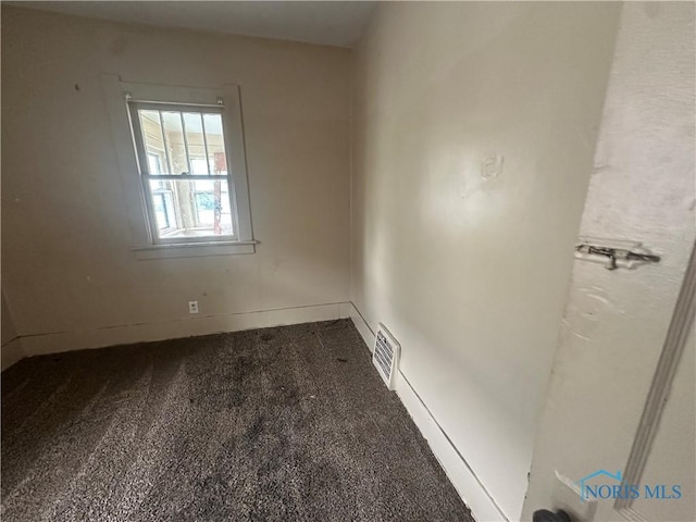 1749 Berdan Ave, Toledo, OH 43613 - empty room with carpet floors and baseboards