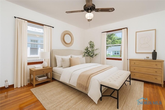 3328 Island Ave, Toledo, OH 43614 - bedroom with light wood-type flooring and a ceiling fan