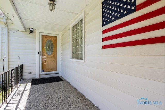 3328 Island Ave, Toledo, OH 43614 - doorway to property featuring covered porch