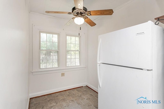 2529 Greenbriar Rd, Toledo, OH 43607 - unfurnished dining area with ceiling fan and baseboards
