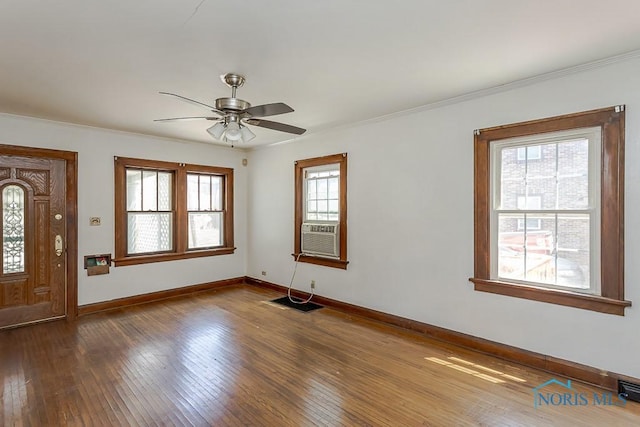 2529 Greenbriar Rd, Toledo, OH 43607 - entrance foyer featuring cooling unit, dark wood-style flooring, a ceiling fan, and crown molding