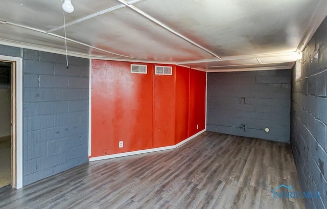 2529 Greenbriar Rd, Toledo, OH 43607 - finished below grade area featuring wood finished floors and concrete block wall