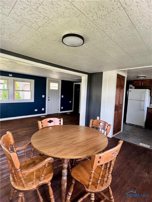 26110 Elizabeth St, Defiance, OH 43512 - dining space with wood finished floors and baseboards