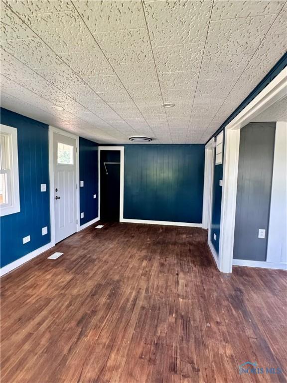 26110 Elizabeth St, Defiance, OH 43512 - unfurnished living room with wood-type flooring