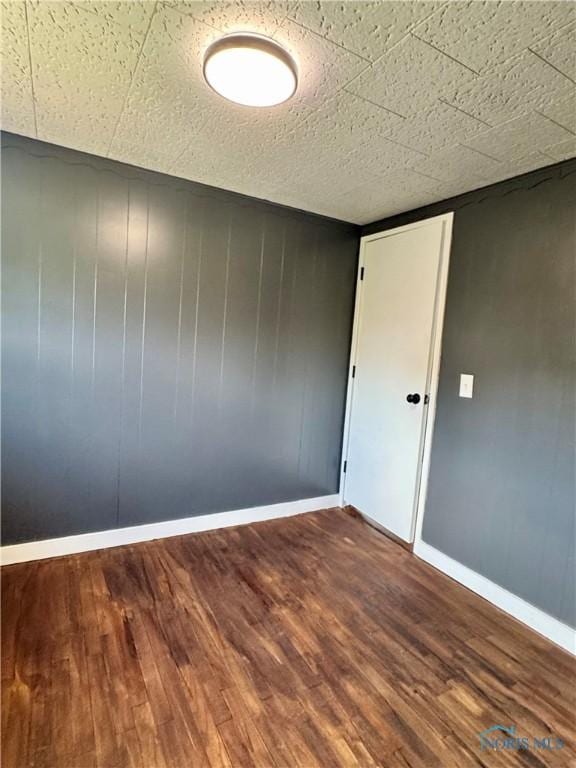 26110 Elizabeth St, Defiance, OH 43512 - unfurnished room featuring wood finished floors and baseboards