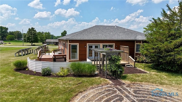 13362 Road 27C, Antwerp, OH 45813 - rear view of property featuring a deck, a yard, and a shingled roof
