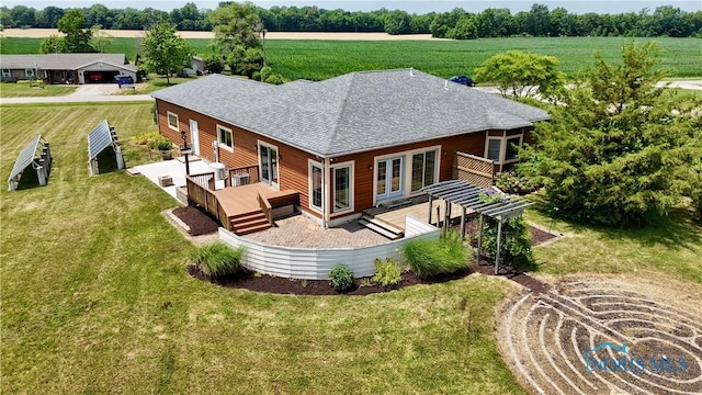 13362 Road 27C, Antwerp, OH 45813 - rear view of property featuring a deck, a shingled roof, a yard, french doors, and a view of rural / pastoral area