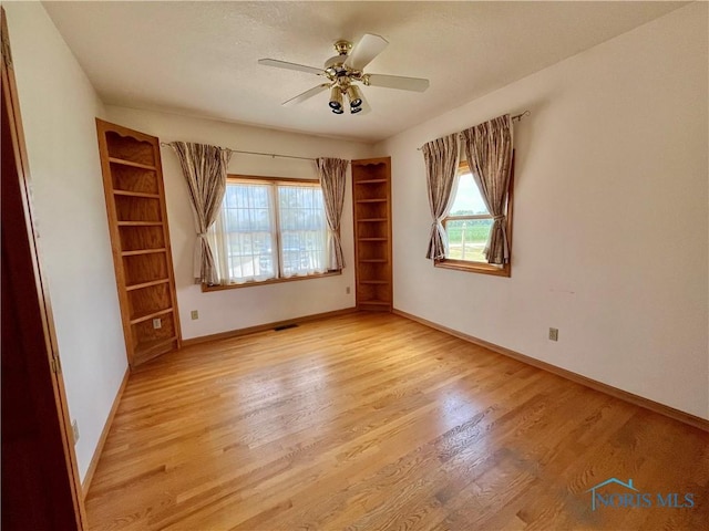 13362 Road 27C, Antwerp, OH 45813 - spare room with light wood-style flooring and ceiling fan
