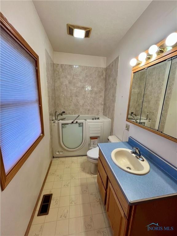 13362 Road 27C, Antwerp, OH 45813 - bathroom with a bath, tile patterned floors, and vanity