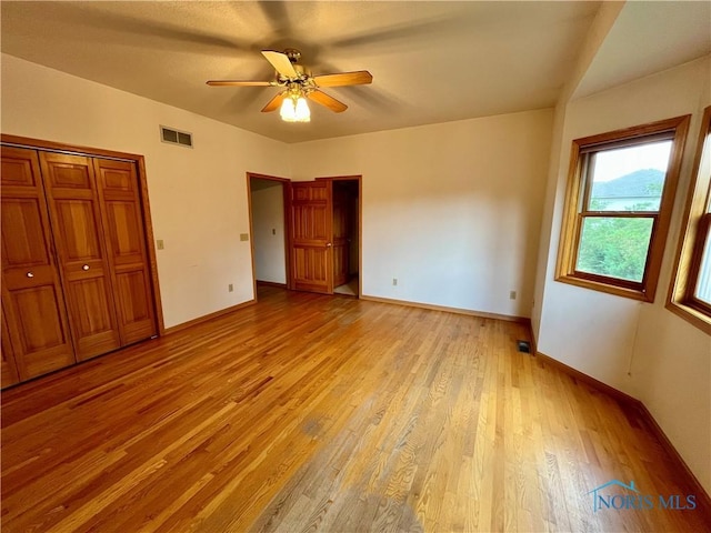 13362 Road 27C, Antwerp, OH 45813 - unfurnished bedroom featuring light wood-type flooring and ceiling fan