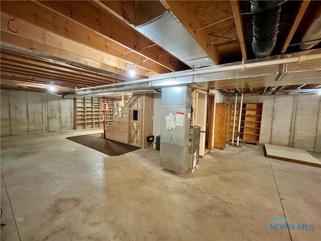 13362 Road 27C, Antwerp, OH 45813 - unfinished basement with heating unit and stairway