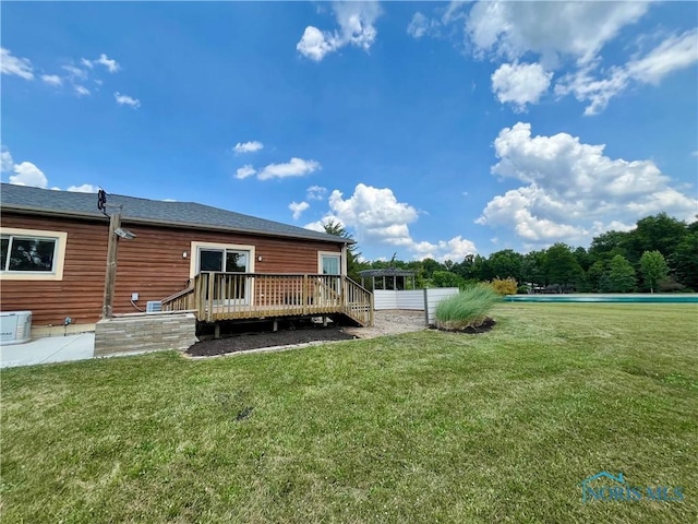 13362 Road 27C, Antwerp, OH 45813 - view of green lawn with a wooden deck