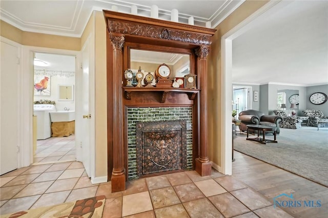 4567 Torquay Ave, Toledo, OH 43615 - detailed view of ornamental molding, washer / dryer, and a tiled fireplace