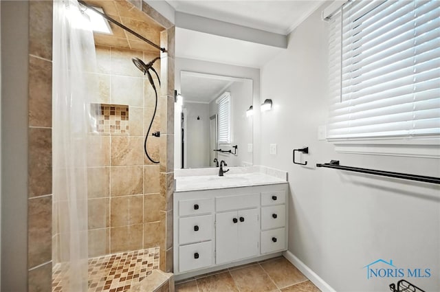 4567 Torquay Ave, Toledo, OH 43615 - bathroom with vanity, a tile shower, and crown molding