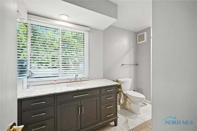 4567 Torquay Ave, Toledo, OH 43615 - bathroom with toilet and vanity