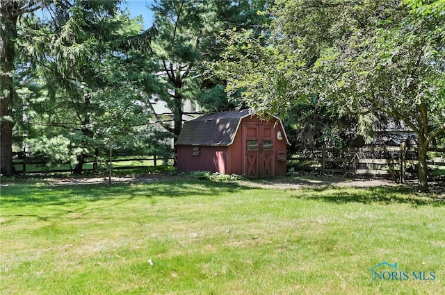 4567 Torquay Ave, Toledo, OH 43615 - view of grassy yard with a storage shed
