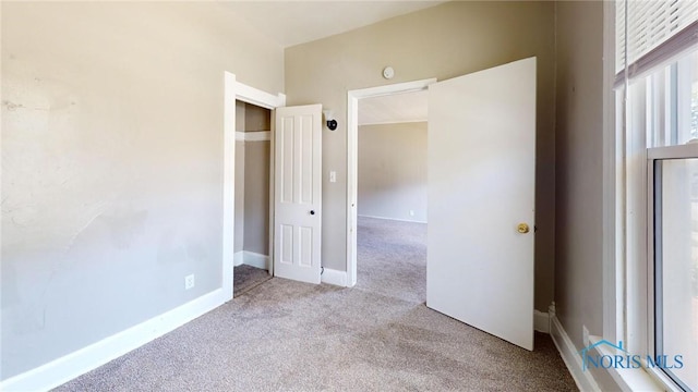 1534 Pinewood Ave, Toledo, OH 43607 - unfurnished bedroom with carpet flooring and baseboards