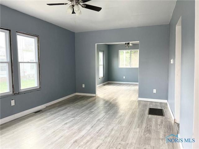 3927 Vermaas Ave, Toledo, OH 43612 - empty room featuring ceiling fan and light wood-style floors