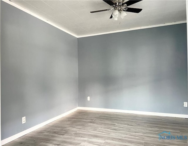 3927 Vermaas Ave, Toledo, OH 43612 - unfurnished room with a ceiling fan, wood finished floors, and ornamental molding