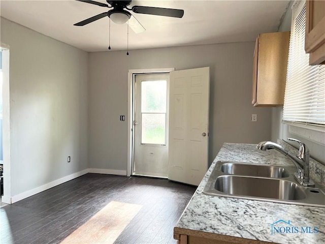 3927 Vermaas Ave, Toledo, OH 43612 - kitchen with a ceiling fan, dark wood-type flooring, and light countertops