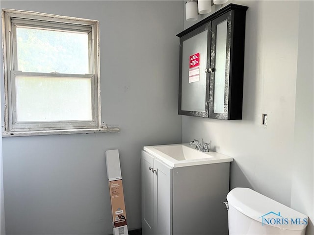 3927 Vermaas Ave, Toledo, OH 43612 - half bath featuring vanity and toilet