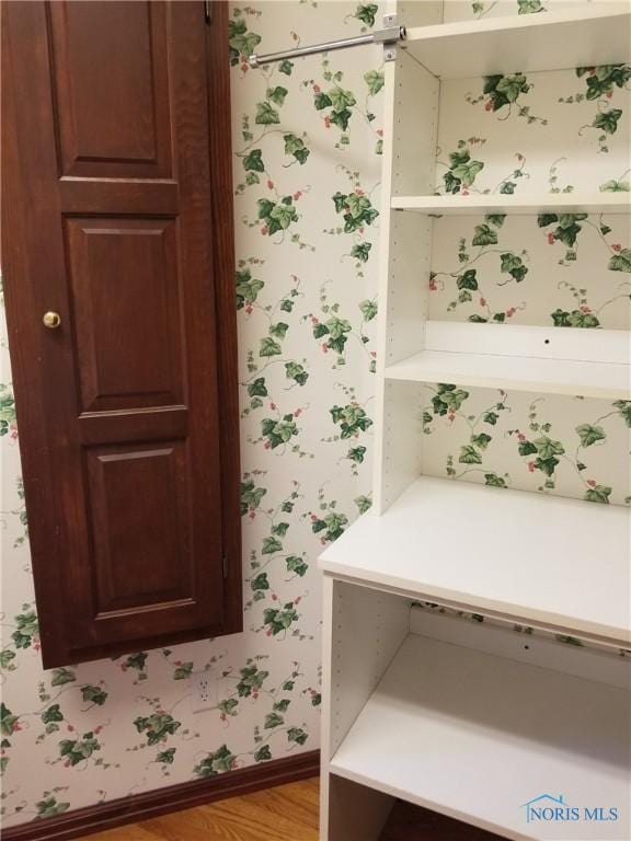 3704 Brookside Rd, Ottawa Hills, OH 43606 - bathroom featuring wallpapered walls and wood finished floors