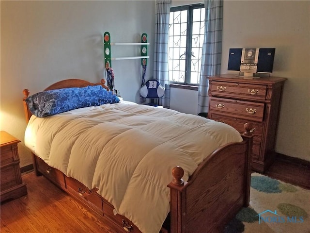 3704 Brookside Rd, Ottawa Hills, OH 43606 - bedroom featuring wood finished floors and baseboards