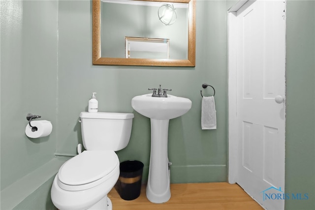 545 Wallace Ave, Bowling Green, OH 43402 - bathroom with wood finished floors and toilet