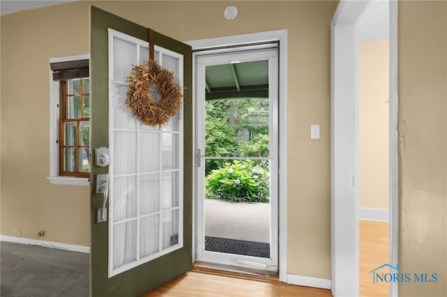 545 Wallace Ave, Bowling Green, OH 43402 - entryway featuring baseboards and wood finished floors