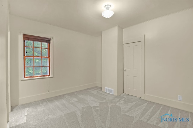 545 Wallace Ave, Bowling Green, OH 43402 - unfurnished bedroom featuring carpet and baseboards