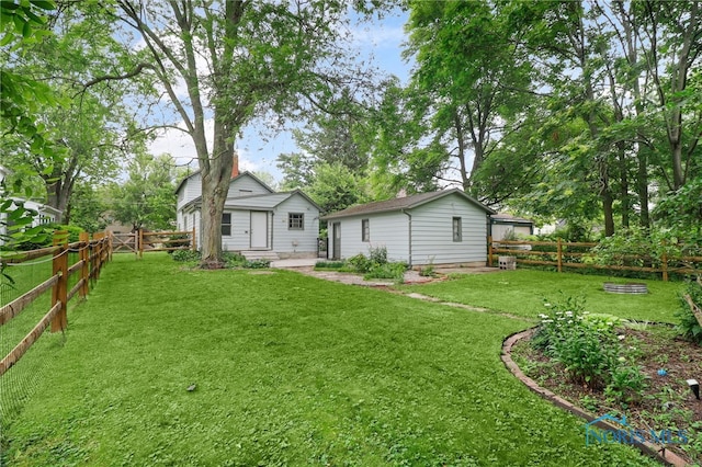 545 Wallace Ave, Bowling Green, OH 43402 - rear view of property with a fenced backyard