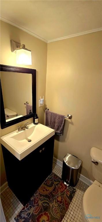 3329 Kirkwall Rd, Ottawa Hills, OH 43606 - bathroom with crown molding, vanity, and tile patterned flooring