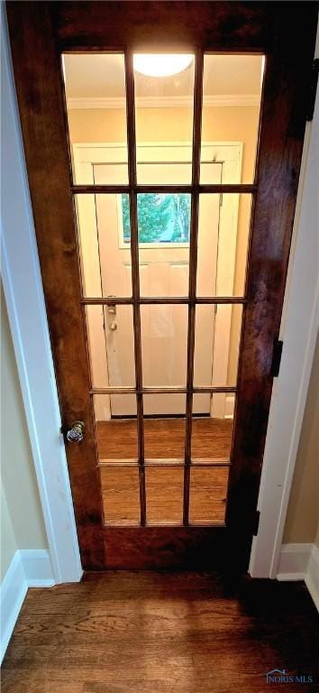 3329 Kirkwall Rd, Ottawa Hills, OH 43606 - doorway with wood finished floors and crown molding