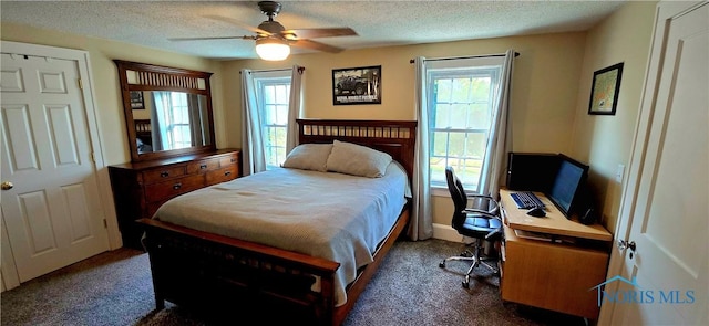3329 Kirkwall Rd, Ottawa Hills, OH 43606 - bedroom with dark colored carpet, a textured ceiling, an office area, and a ceiling fan